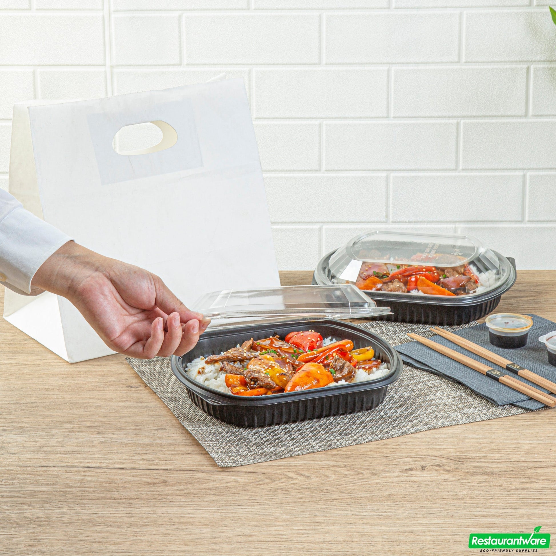 Wholesale Restaurantware 36 Oz Rectangle Black Plastic Food Container - with Clear Lid, Microwavable - 9 1/4" X 7 3/4" X 2 3/4" - 50 Count Box- Bulk